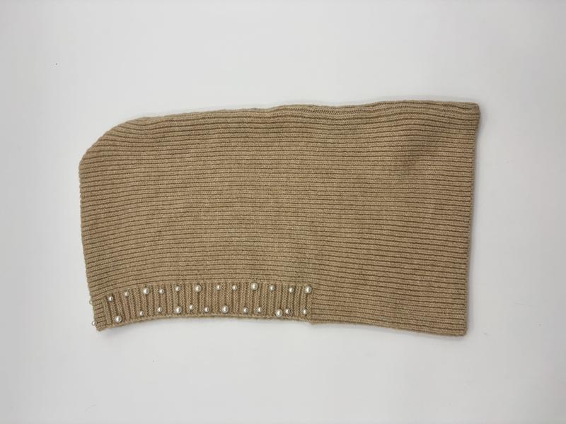 Camel beige ribbed knit neck warmer tube scarf with pearl bead trim along the bottom edge, laid flat on white background