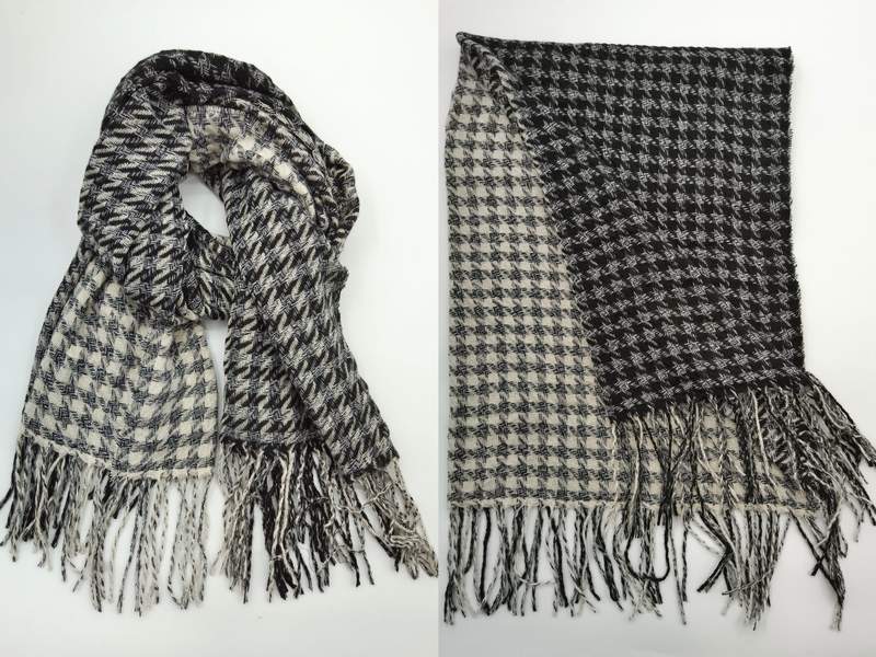 Black and cream houndstooth pattern woven scarf with long fringe trim, shown draped and flat lay views