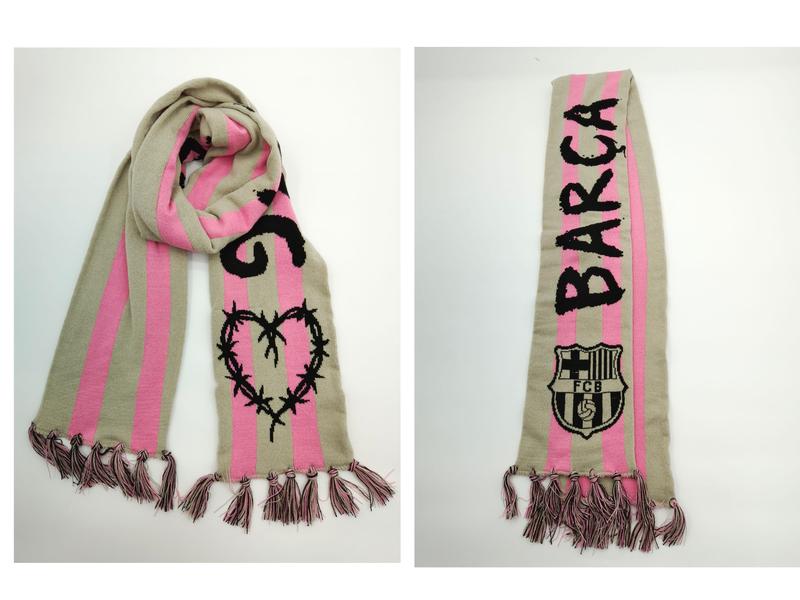 Knitted beige and pink striped football fan scarf with Barca FCB crest, heart motif, and twisted fringe tassels, shown front and back