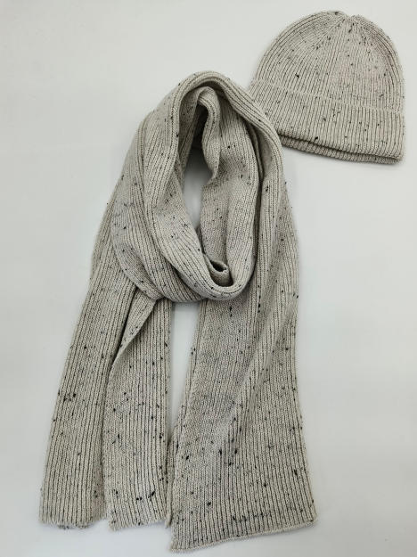Light grey ribbed knit scarf and matching beanie hat set with dark fleck speckle pattern on white background