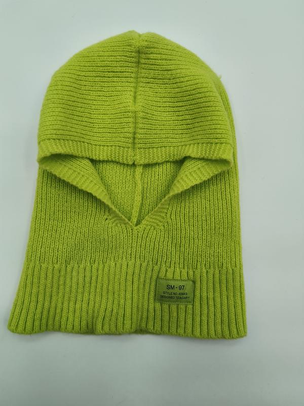 Lime green ribbed knit balaclava ski mask laid flat on white background, showing face opening and woven label