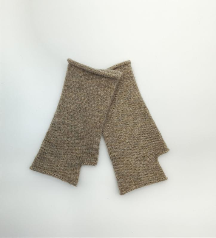 Pair of heathered taupe knitted fingerless gloves laid flat on white background, showing thumbhole detail
