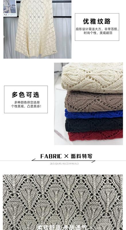 Stacked folded open-knit sweaters in cream, taupe, blue, black and red showing fan lace pattern texture detail