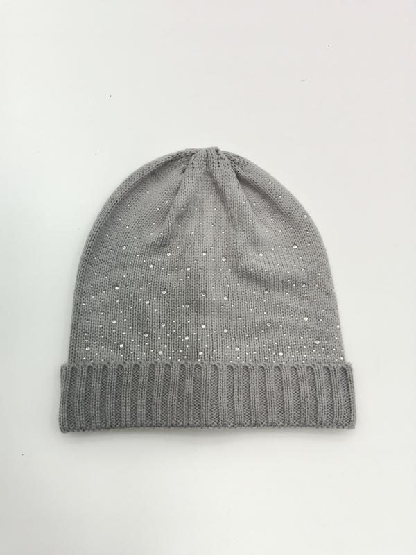 Gray ribbed cuff knit beanie hat scattered with small crystal rhinestone studs on a white background