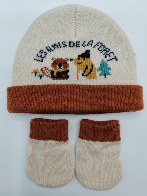 Cream and rust knit baby beanie hat with forest animals intarsia design and matching booties set laid flat