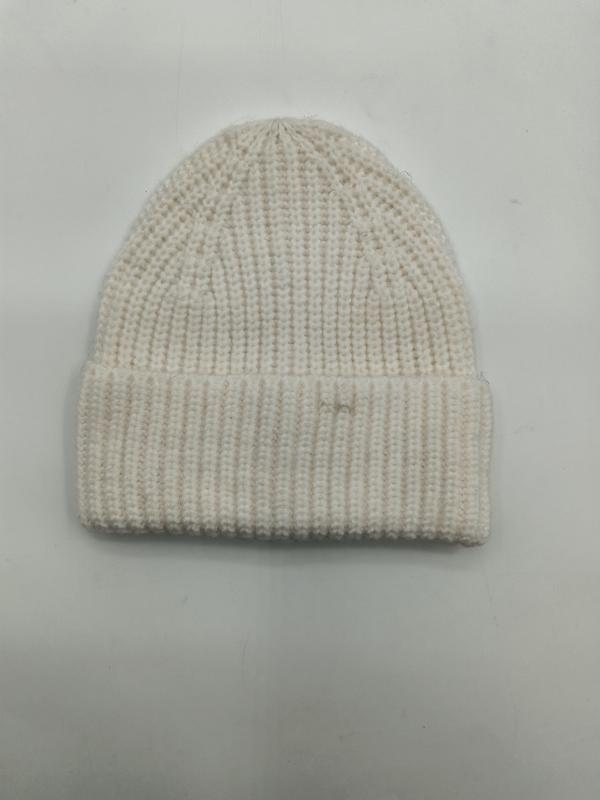 Cream off-white chunky ribbed knit beanie hat with fold-over cuff laid flat on white background