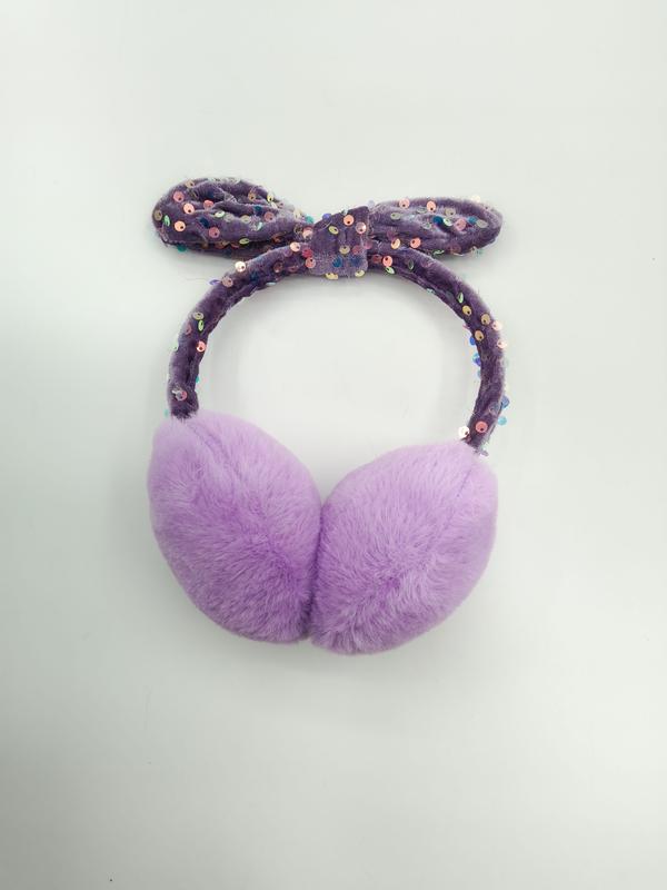 Lavender plush faux fur earmuffs with dark purple sequin-embellished headband and decorative bow on white background